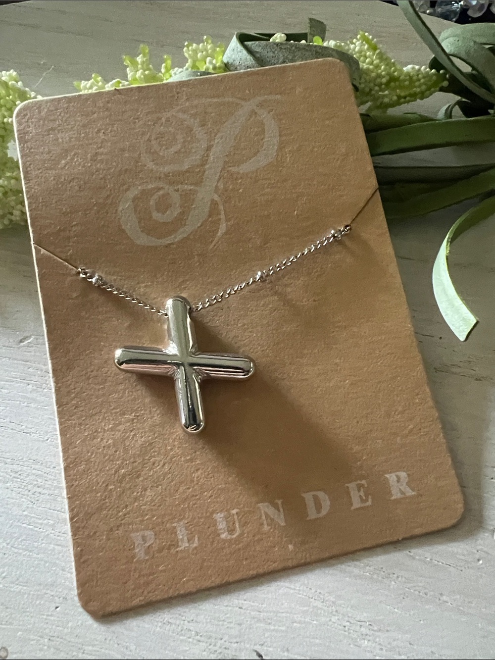Plunder “X” silver tone necklace